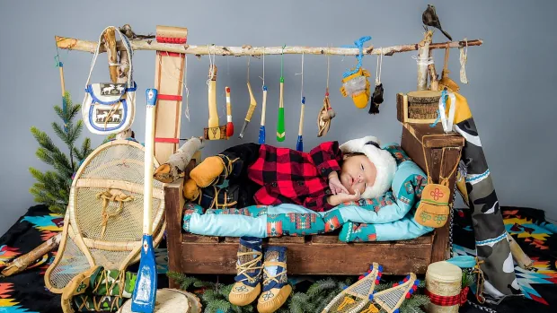 Tiny snowshoes and otter’s feet: Cree parents celebrate healthy birth with photo shoot